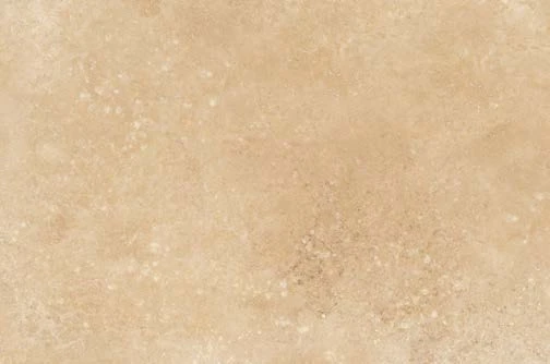 Warm cross-cut travertine with a filled honed finish
